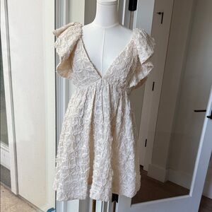 Textured Cream V-Neck Mini Dress with Flutter Sleeves